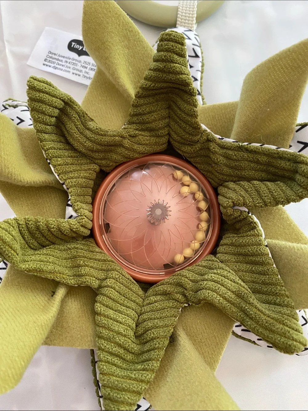 Plush Sunflower Teething Toy in Olive Green by Tiny Love